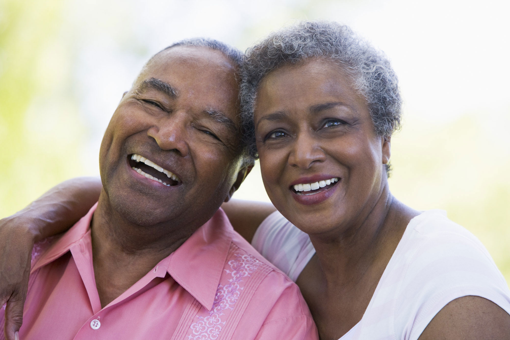 elderly couple smiling